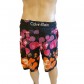 CK Swimwear - SHORT DE BAIN LONG NOIR/ORANGE 58115W2-900